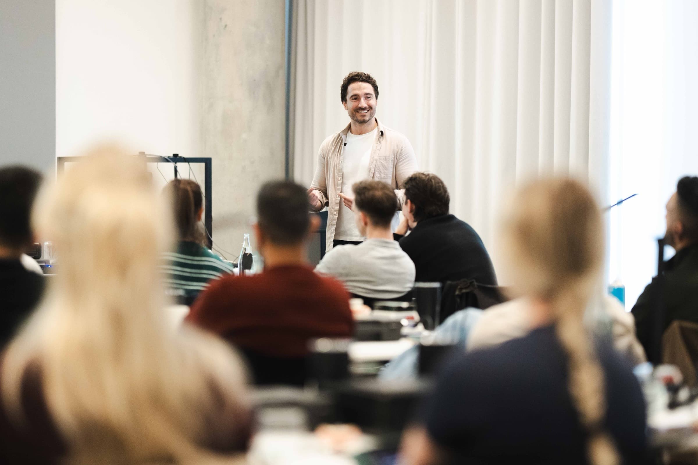 Dr Albert Gajdos teaching a room of delegates at a Simplifi course