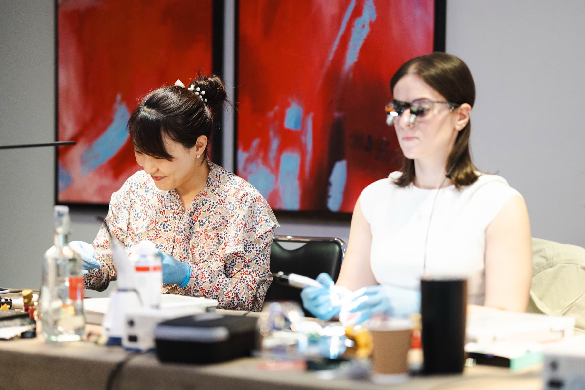 Two delegates working side by side on the Simplifi Composite course